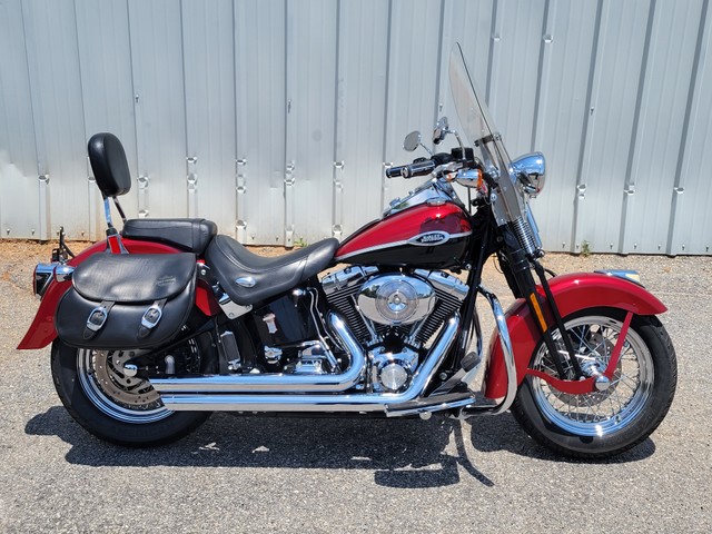 2006 Harley Davidson
Softail Springer Classic FLSTSCI
Two-tone Fire Red Pearl & Vivid Black
Fuel-injected with 26,701 miles
Equipped with 88