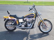2004 Harley Davidson
Dyna Wide Glide FXDWGI
Two-tone Nebula Yellow Pearl & Indigo Blue Pearl
Fuel-injected with 43,437 miles
Equipped with 88