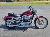 2004 Harley Davidson
Sportster XL1200C
Lava Red Sunglo with 17,514 miles
Equipped with 1200cc motor, 5-speed transmission, forward controls, Vance & Hines exhaust, Mustang seat and more!  Financing and warranty are available.
Hawg Pen Price $3,995.00