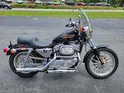 2000 Harley Davidson
Sportster XL883
Vivid Black with 14,378 miles
Equipped with 883cc motor, 5-speed transmission, quick-detachable windshield, chrome hand controls, forward controls, Screamin' Eagle exhaust, chrome swingarm and more!  Financing and warranty are available.
Hawg Pen Price $3,995.00
