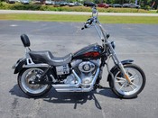 2007 Harley Davidson
Dyna Super Glide FXD
Vivid Black with 17,669 miles
Equipped with 96